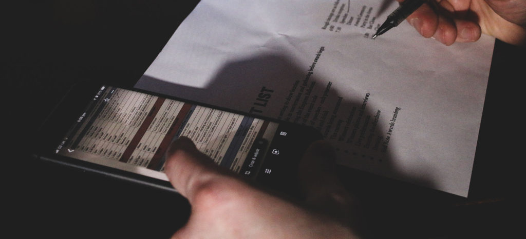 An image of a shotlist being checked on a phone